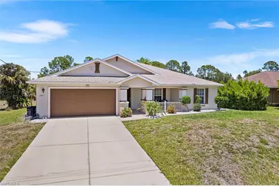 1061 Lilac St E, Lehigh Acres, FL 33974 - Photo 1