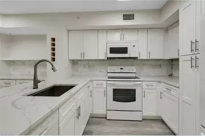 1220 Wildwood Lakes Blvd #108, Naples, FL 34104 - Photo 1