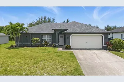 320 NW 1st St, Cape Coral, FL 33993 - Photo 1
