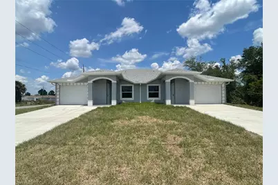 701/703 Ivan Ave S, Lehigh Acres, FL 33973 - Photo 1