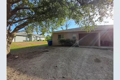 133 Meadow Rd, Lehigh Acres, FL 33973 - Photo 1