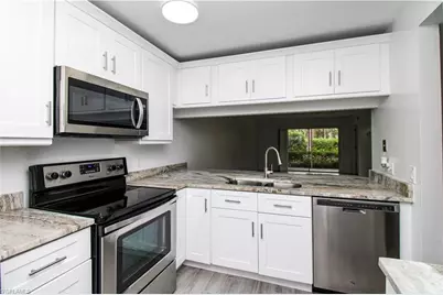 2566 Kings Lake Blvd #104, Naples, FL 34112 - Photo 1