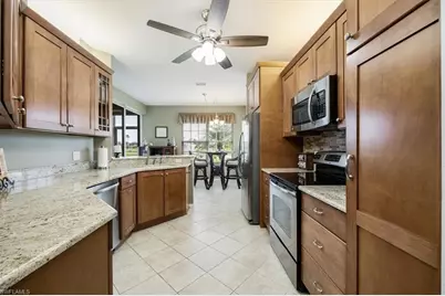 5921 Three Iron Dr #2902, Naples, FL 34110 - Photo 1