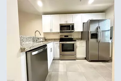 1631 SW 1st Ave #104, Cape Coral, FL 33991 - Photo 1