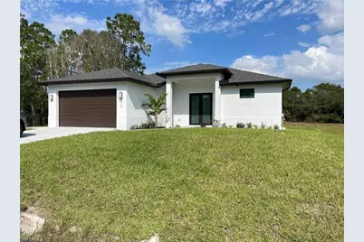 615 Addison St E, Lehigh Acres, FL 33974 - Photo 1