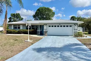 405 Parkside St, Lehigh Acres, FL 33936 - Photo 1