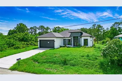 739 David Laird Ln, Lehigh Acres, FL 33974 - Photo 1