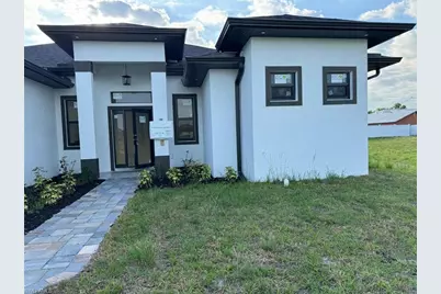 707 NE Juanita Pl, Cape Coral, FL 33909 - Photo 1