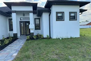 707 NE Juanita Pl, Cape Coral, FL 33909 - Photo 1