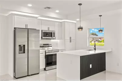 614 Ames St E, Lehigh Acres, FL 33974 - Photo 1