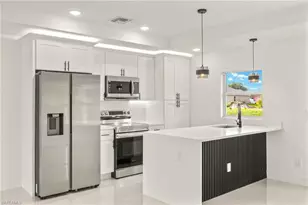 614 Ames St E, Lehigh Acres, FL 33974 - Photo 1