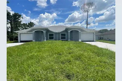 397/399 Carrillon Ave S, Lehigh Acres, FL 33974 - Photo 1