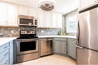 1 High Point Cir W #102, Naples, FL 34103 - Photo 1