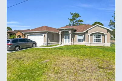 682 Delmonico St, Lehigh Acres, FL 33974 - Photo 1