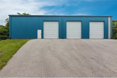 730 29th St SW, Naples, FL 34117 - Photo 1