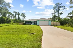 4703 Joan Ave S, Lehigh Acres, FL 33976 - Photo 1
