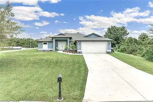 860 Theodore Vail St E, Lehigh Acres, FL 33974 - Photo 1