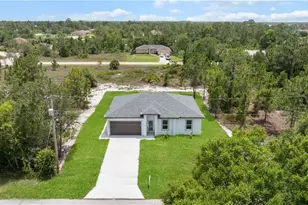 858 Portland St E, Lehigh Acres, FL 33974 - Photo 1