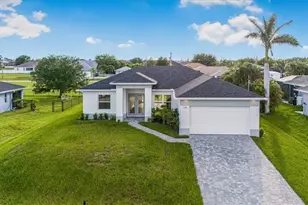 128 NW 26th Pl, Cape Coral, FL 33993 - Photo 1