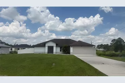 833 Eisenhower Blvd, Lehigh Acres, FL 33974 - Photo 1