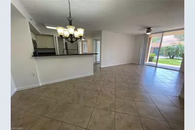 1210 Wildwood Lakes Blvd #105, Naples, FL 34104 - Photo 1