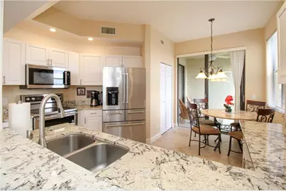 7024 Pelican Bay Blvd #F-504, Naples, FL 34108 - Photo 1