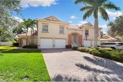 25050 Peacock Ln #201, Naples, FL 34114 - Photo 1