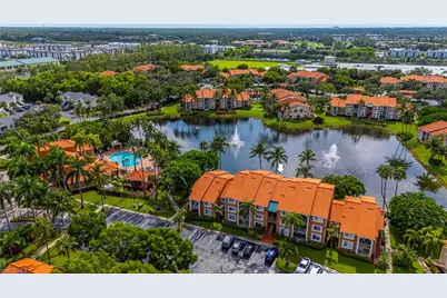 1275 Wildwood Lakes Blvd #203, Naples, FL 34104 - Photo 1