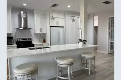 1305 Sweetwater Cv #203, Naples, FL 34110 - Photo 1