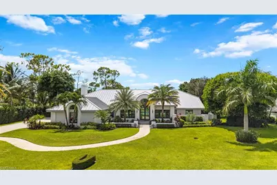 13029 Bald Cypress Ln, Naples, FL 34119 - Photo 1