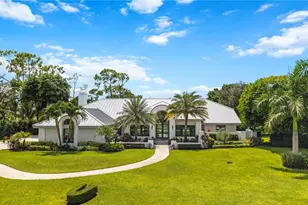 13029 Bald Cypress Ln, Naples, FL 34119 - Photo 1