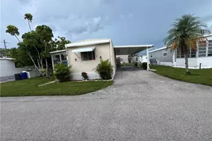 2035 2035 Seagrape Ct NE, Naples, FL 34110 - Photo 1