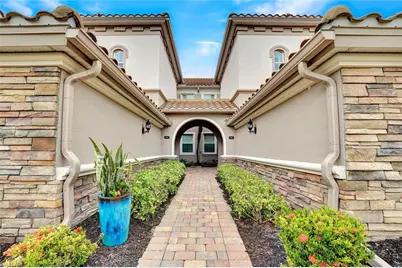 8839 Nautical Landing Cir #202, Naples, FL 34120 - Photo 1