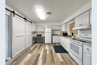 649 93rd Ave N, Naples, FL 34108 - Photo 1