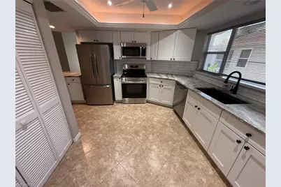 9836 Luna Cir #F-204, Naples, FL 34109 - Photo 1