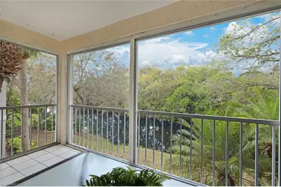 25208 Pelican Creek Cir #201, Bonita Springs, FL 34134 - Photo 1