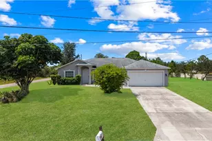 720 Bedford Point Ave, Lehigh Acres, FL 33974 - Photo 1