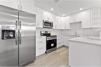 2398 54th Ter SW #Unit B, Naples, FL 34116 - Photo 1