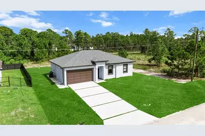 925 Winters St E, Lehigh Acres, FL 33974 - Photo 1