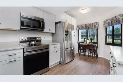 4957 Pepper Cir #C104, Naples, FL 34113 - Photo 1