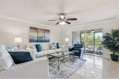 5435 Rattlesnake Hamm Rd #E-304, Naples, FL 34113 - Photo 1