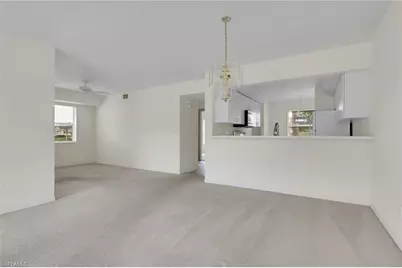162 Pebble Shores Dr #104, Naples, FL 34110 - Photo 1