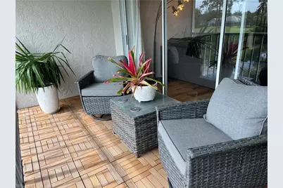 740 Augusta Blvd #E203, Naples, FL 34113 - Photo 1