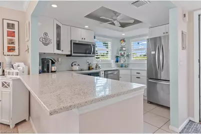 37 High Point Cir E #210, Naples, FL 34103 - Photo 1