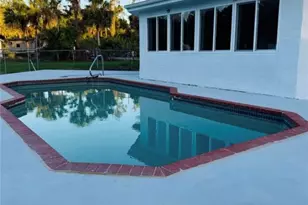 250 10th St NE, Naples, FL 34120 - Photo 1