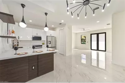 3437 70th Ave NE, Naples, FL 34120 - Photo 1