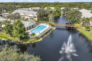 174 Pebble Shores Dr S, Naples, FL 34110 - Photo 1