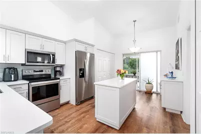 4945 Cougar Ct S #4-202, Naples, FL 34109 - Photo 1