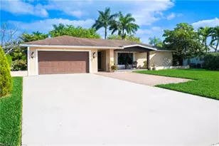 233 Baltusrol Dr, Naples, FL 34113 - Photo 1