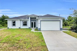 823 Hoosier St E, Lehigh Acres, FL 33974 - Photo 1